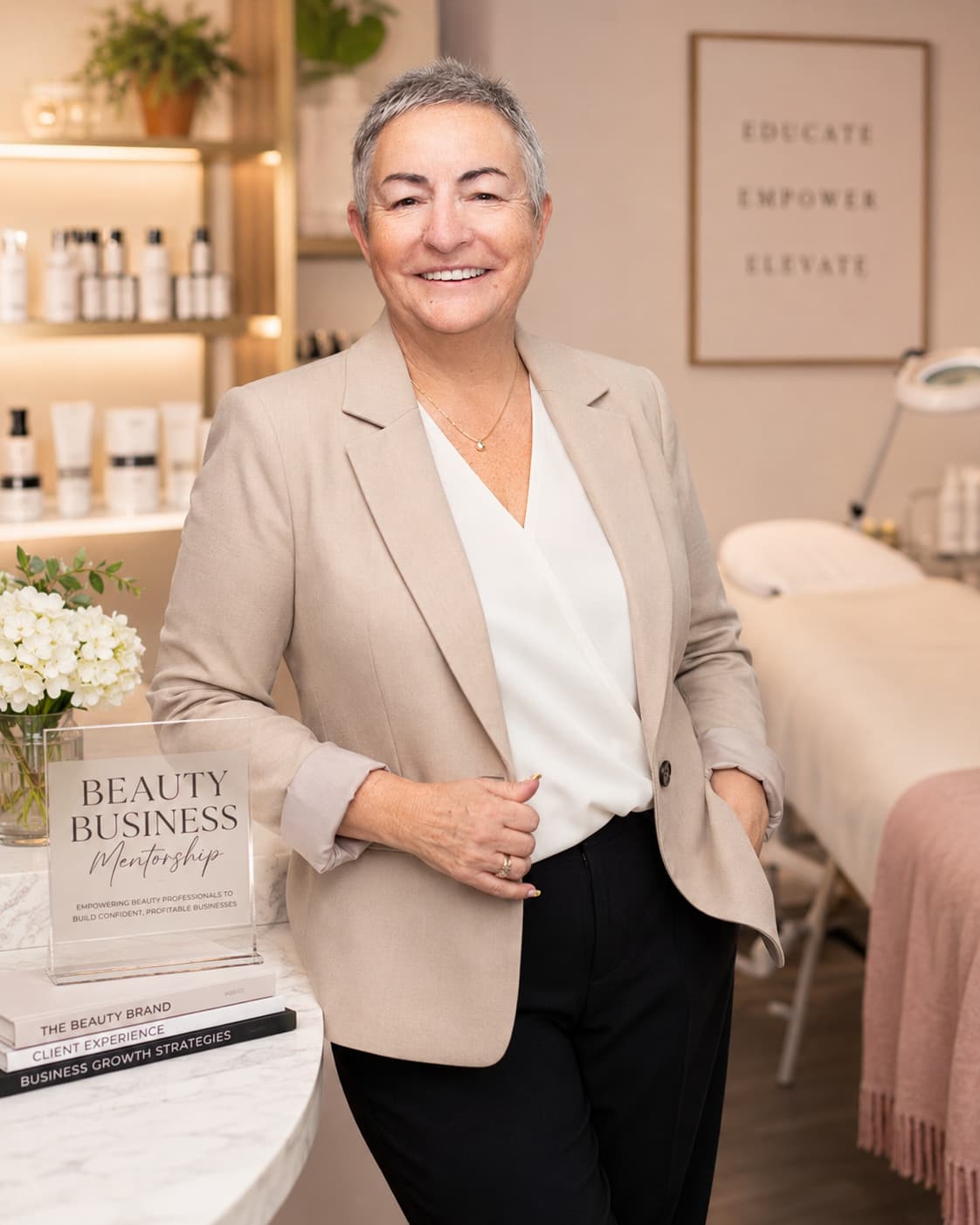 Jane in a suit in a salon room